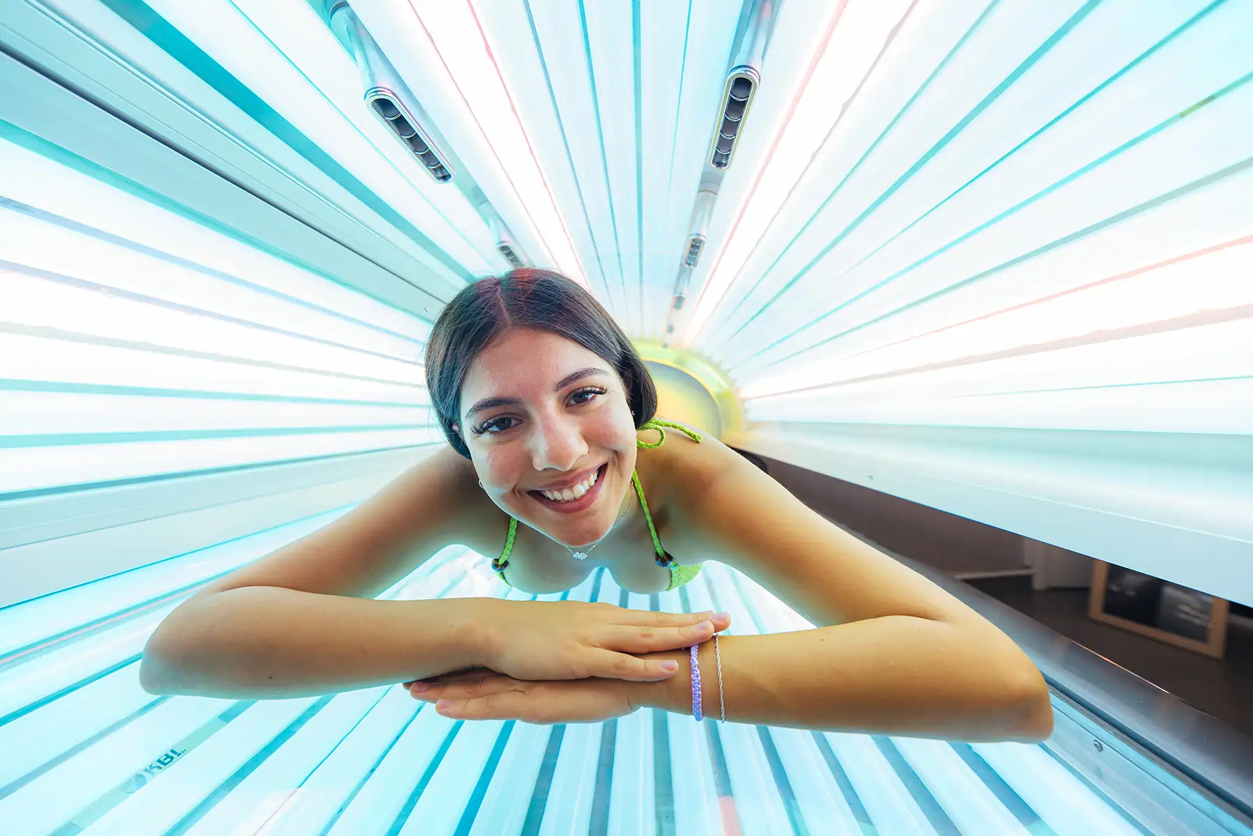 Woman tanning in a MegaSun bed