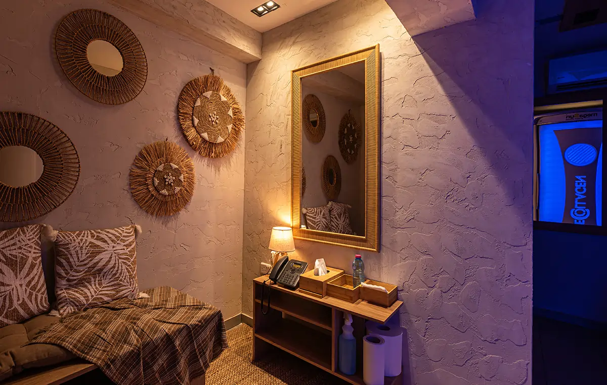 Comfortable relaxation seating area beside MegaSun tanning bed at MegaSun Solarium Larnaca