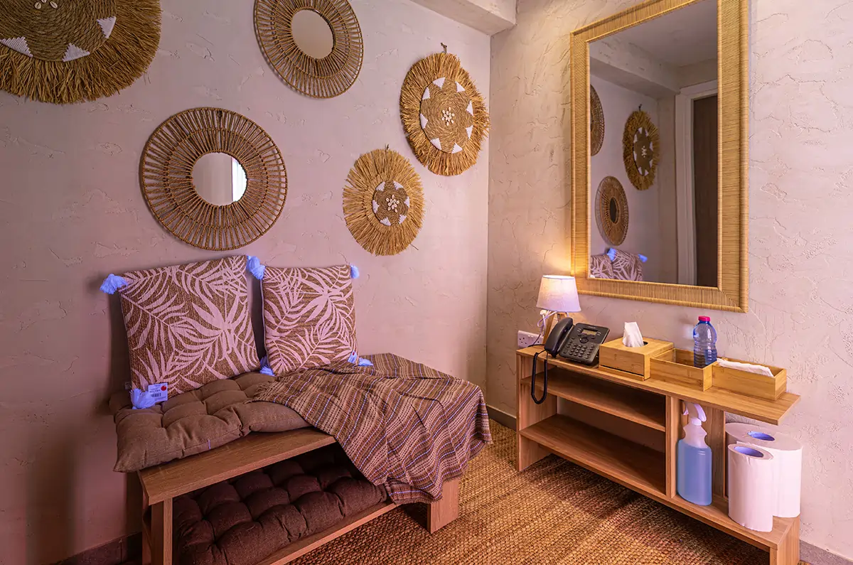 Relaxing seating area at MegaSun Solarium Larnaca inside Rise Urban Art Hotel with natural décor and wellness-inspired design